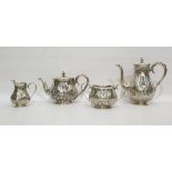 Late Victorian silver tea and coffee set with Art Nouveau decoration of stylised flowers trailing