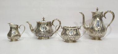 Late Victorian silver tea and coffee set with Art Nouveau decoration of stylised flowers trailing