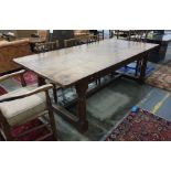 Early 20th century oak rectangular plank-top farmhouse table on turned supports, stretchered base