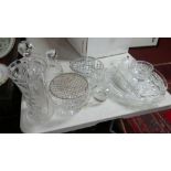 A collection of crystal to include a pair of posy vases, 2 decanters, 4 trays etc