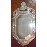 An early 20th century Venetian mirror with acid etched floral border and bevelled plates, 93 x 47cm