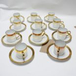 A Legle, Limoges, part coffee set, comprising 12 coffee cups and 12 saucers, hand-painted with