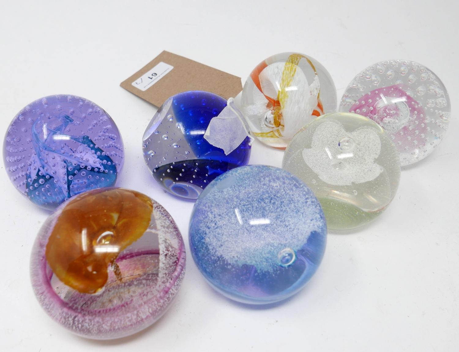 Seven Caithness glass paperweights to include cauldron, pink champagne, calypso, sirocco and ribbons