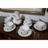 A Wedgwood Insignia part tea set, to include a teapot, hot water pot, four cups and five saucers, (
