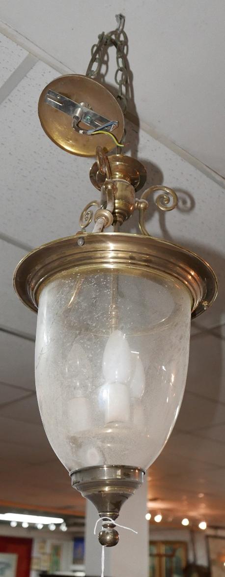 A brass and glass ceiling lantern