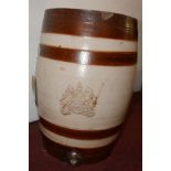 A stoneware barrel with the Royal Coat of Arms, H.55cm Diameter 38cm