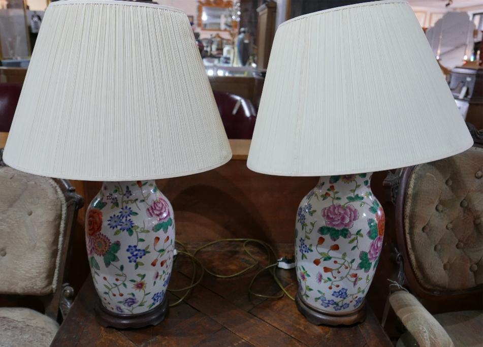A pair of Chinese porcelain table lamps with floral decoration