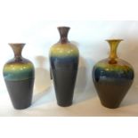 Three Persian drip glazed vases of varying size and form, H.40cm (tallest) (3)