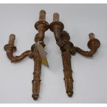 A pair of carved wood two branch wall sconces in the Classical style, H.40cm