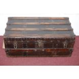 An early 20th century ash and iron bound vintage travelling trunk, H.31 W.78 D.43cm