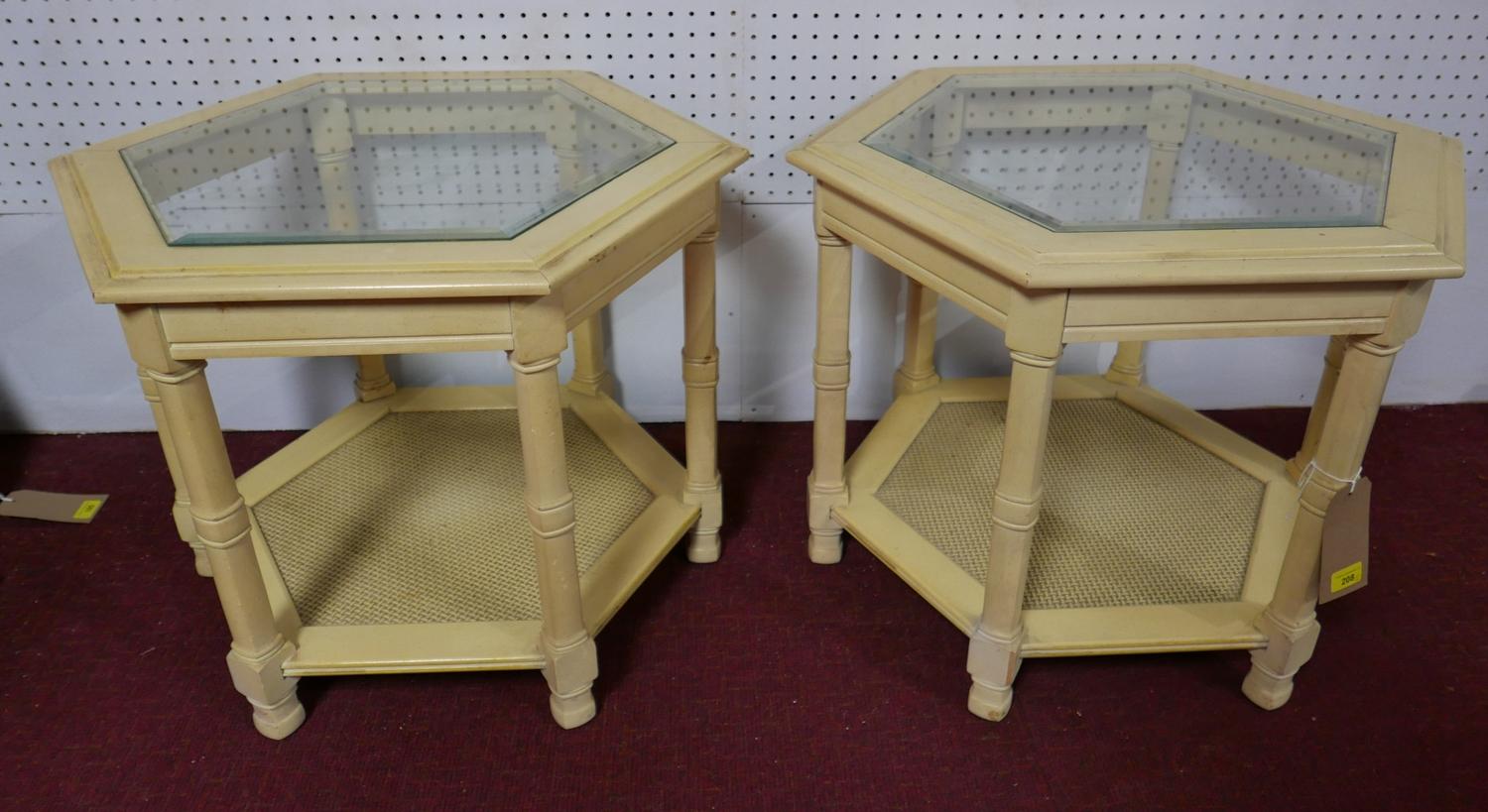 A pair of glass topped hexagonal side tables. H.53cm