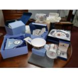 A collection of cased Wedgwood pieces and Royal Crown Derby