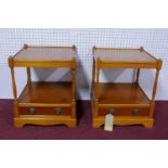 A pair of Georgian style yew 2 tier bedside cabinets. H.55 W.43 D.43cm