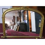 A Victorian style arched gilt overmantel mirror, H.88 W.138cm