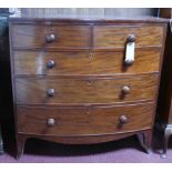 A Georgian mahogany bowfronted chest of two short over three long oak lined drawers on swept feet,