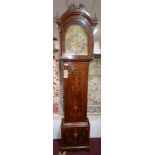 An 18th century mahogany and marquetry inlaid longcase clock, three train movement, eight chiming