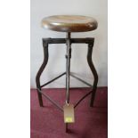 An industrial style adjustable revolving stool