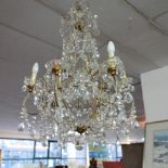 An 18th century style Venetian six branch chandelier with glass droplet decoration