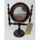 A Victorian turned beech toilet mirror of small size with original concave glass, H.29cm