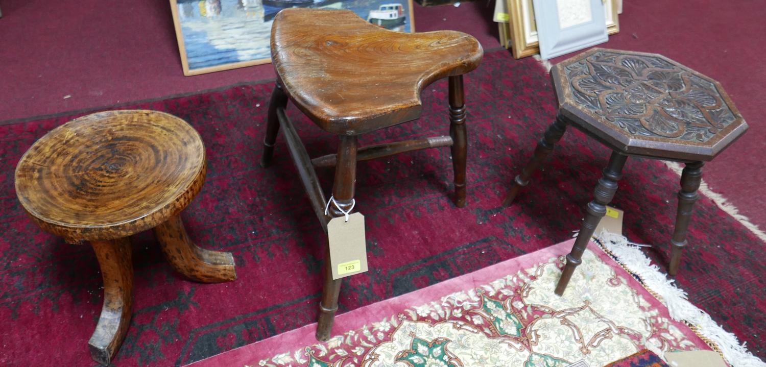 An Ethiopian stool together with two other stools