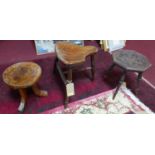An Ethiopian stool together with two other stools