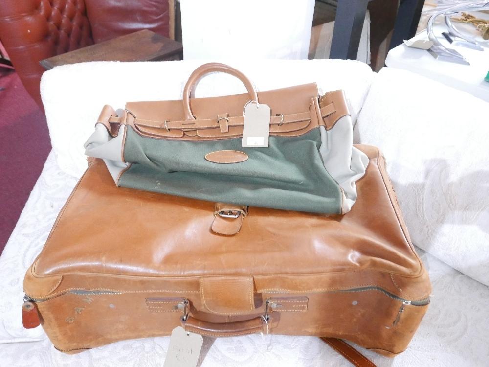 A vintage calf skin holdall, monogrammed S.A.M. L.68cm and another similar with Facconable label.