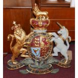 A painted plaster armorial crest, 75 x 69cm