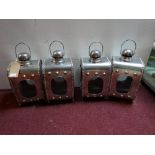 Four industrial storm lanterns, H.48cm