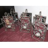 Six cast metal rectangular storm lanterns with mirrored backs, H.44cm