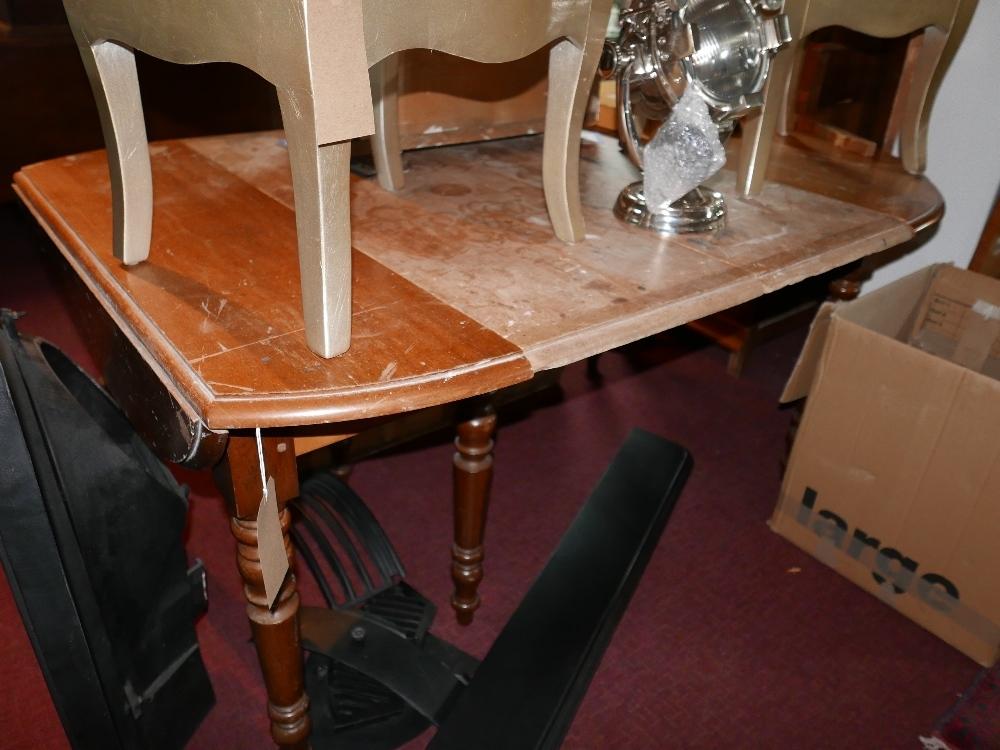 A 19th century mahogany extending dining table with three extra occasional leaves in pine, H.73 W.