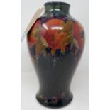 An early William Moorcroft vase, with pomegranate design, signed in paint to base with impressed