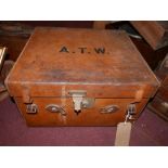 An early 20th century Army & Navy leather travel case, H.30 W.50 D.46cm