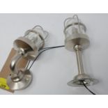 A pair of chrome wall mounted ship's lights, boxed and unused.