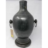 A large Chinese bronzed vase converted to a lamp with twin-side handles and on a fitted hardwood