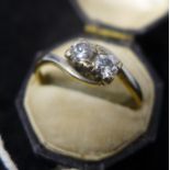 A boxed Victorian 18ct yellow gold double diamond ring, set with two brilliant cut diamonds in