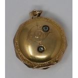A 14k yellow gold pocket watch case (no movement), hinged lid, the exterior with floral border and