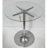 A circular glass and chrome occasional table, on star pedestal base, H.72cm Diameter 60cm