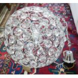 A chrome and glass ceiling chandelier. D.50cm