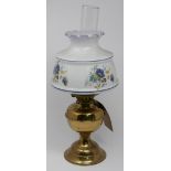 An early 20th century brass oil lamp with opaqure shade, H.47cm