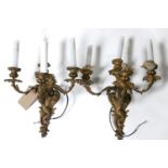 A pair of 20th century ormolu wall lights, recently re-wired