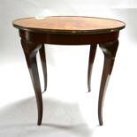 An early 20th century French walnut and brass bound occasional table raised on cabriole legs, H.62cm