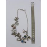 A sterling silver linked charm necklace set with 21 sterling silver individual charms, L: 41cm,