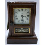 A late 19th century American clock by Seth Thomas, in mahogany case inset with verre eglomise panel,