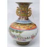 A large, early 20th century, Chinese baluster vase decorated with a central panel of hand-