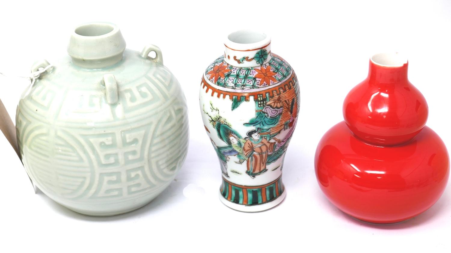 Three Chinese vases to include a spherical, celadon glazed example with incized marks to base 13.5 x
