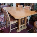 A 20th century 'Arts & Crafts Cotswold style oak 'Tre-tower' refectory dining table