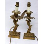 A pair of brass Rococo style table lamps. H.35cm