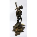 A 19th century French cast gilt metal cherub on a naturalistic base, bearing mark for Strofel,