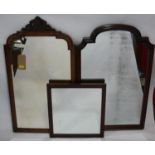 A Victorian walnut mirror with arch top and shell crest with beveled plate together with a