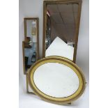 A rectangular gilt frame dressing mirror together with a gilt oval mirror and a 'over door' gilt